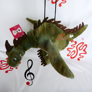 Плюшевая музыкальная игрушка Игрушка-динозавр